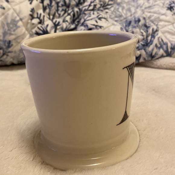 Black and white decorative mug with the capital letter N stamped on the bottom - Picture 6 of 12